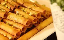 أصابع الجبن شيرة وفستق