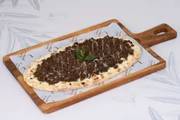 لحم بعجين مع دبس الرمان
