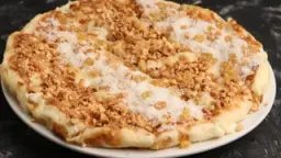 فطيره كريمه وعسل وقشطه ومكسرات ( فطيره نجف)