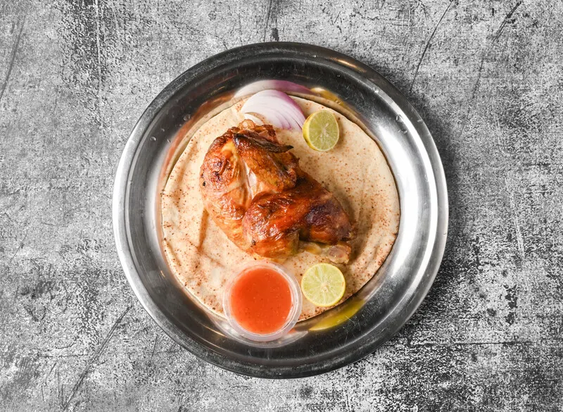 Half grilled chicken
