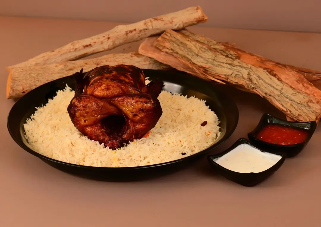 One Whole Saadia chicken with rice