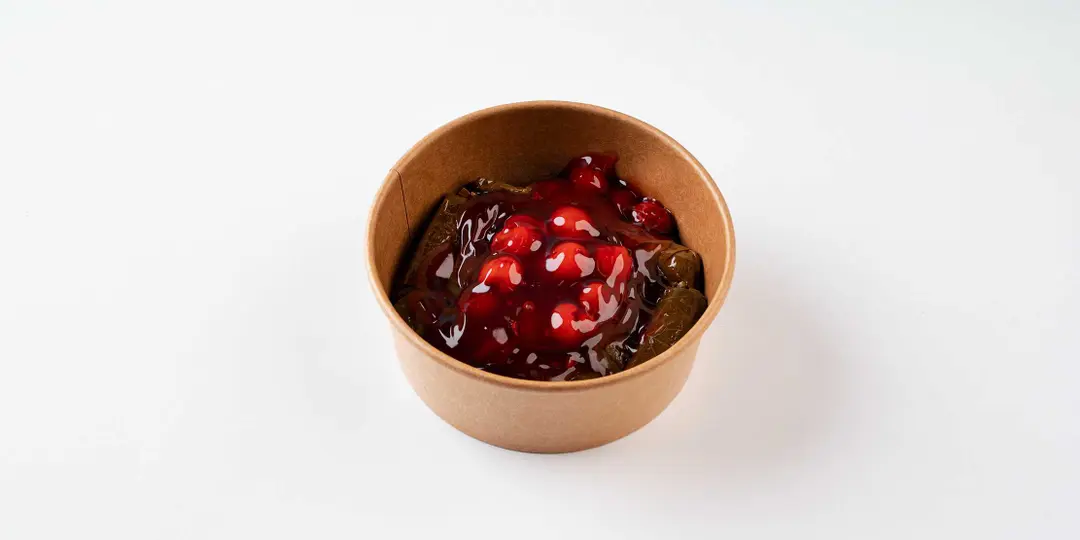Grape leaves with cherries