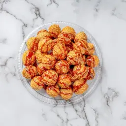 Sesame Luqaimat Stuffed with Cheese