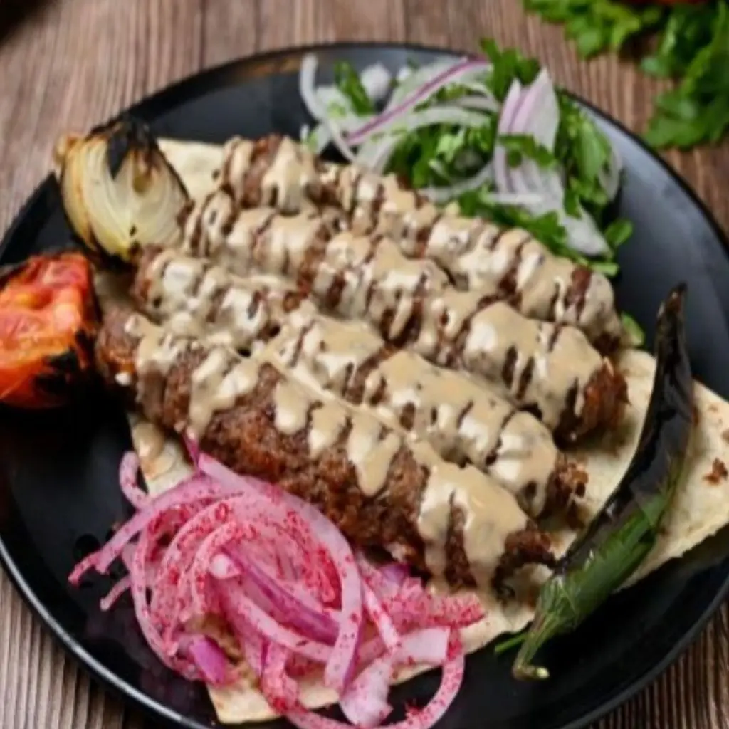 كباب بالطحينه 4أسياخ نفر