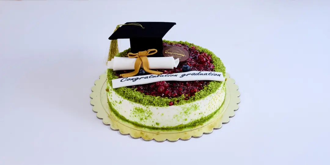 Graduation cake with pistachio and pomegranate
