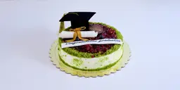 Graduation cake with pistachio and pomegranate
