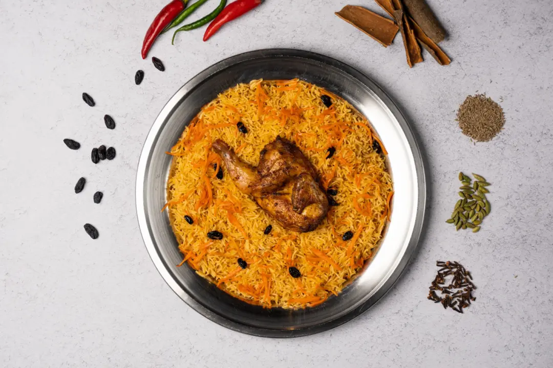نصف دجاج فرن  رز بخاري