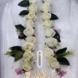 عقد ورد مع تغريسة التخرج