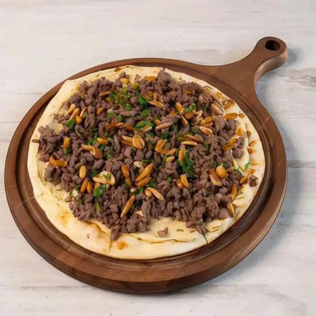 دنوشة باللحم والصنوبر البلدي