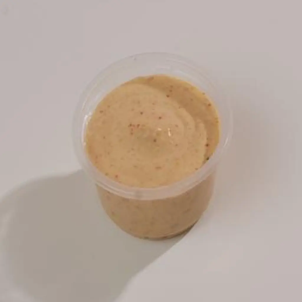 علبة صوص الثوم الحار