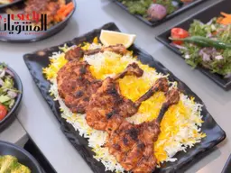 ريش الدجاج مع الرز