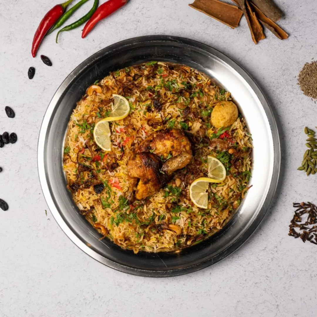 نصف دجاج شواية - رز بخاري