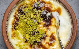 رز بالحليب فخارة