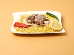 Makmout Meat with Smoked Rice