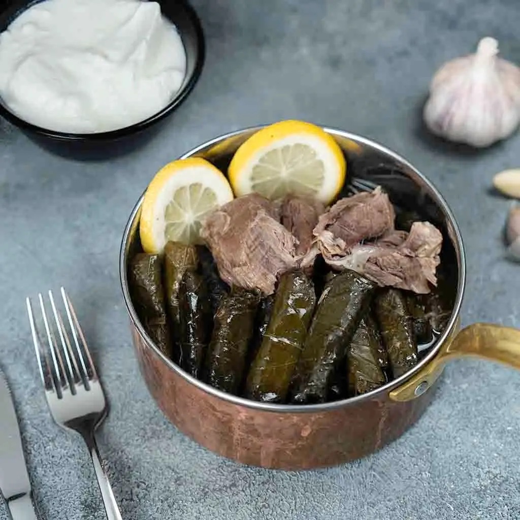 Grape leaves with lamb legs