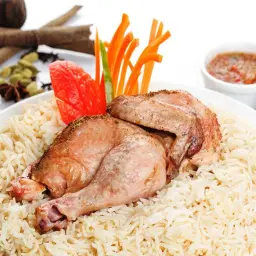 حنيذ مع الرز