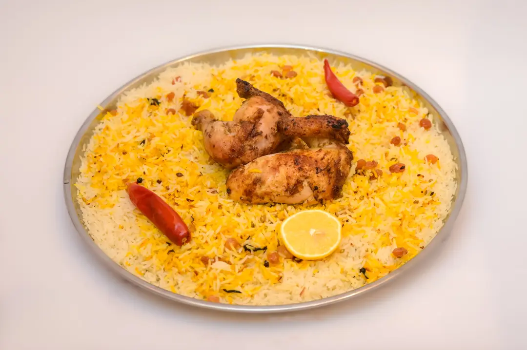 نصف دجاج شواية مع ارز شعبي