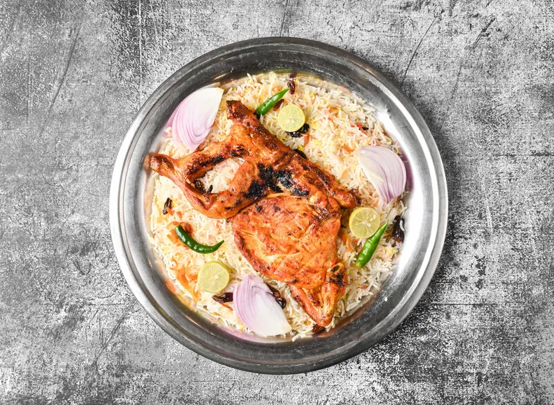 Half grilled chicken with rice