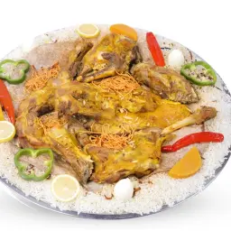 نصف تيس لحم مندي مع الارز