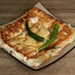 Savory Muttabaq With Meat And Cheese
