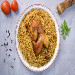 دجاج مجبوس حساوي مع أرز مجبوس حساوي