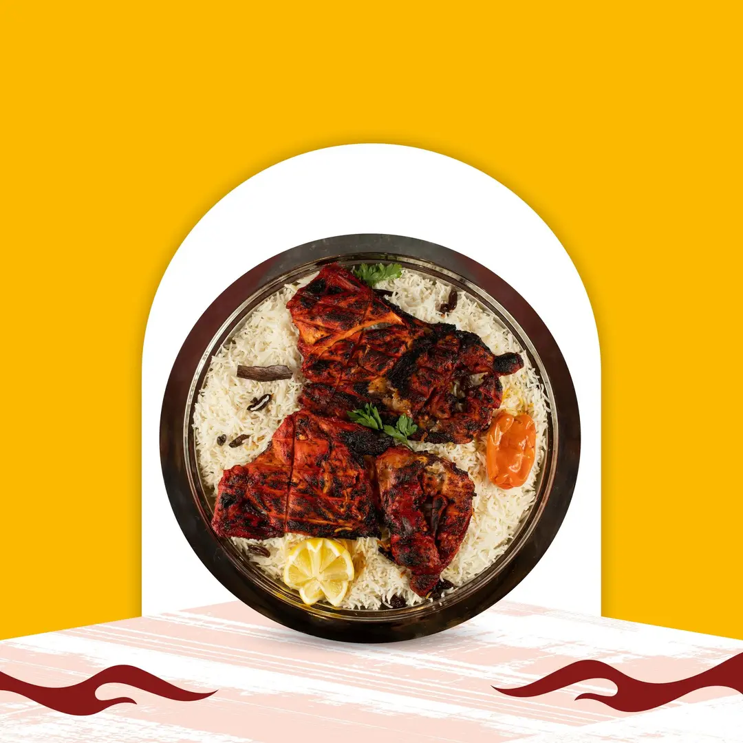 نص دجاج فحم مع الرز الشعبي