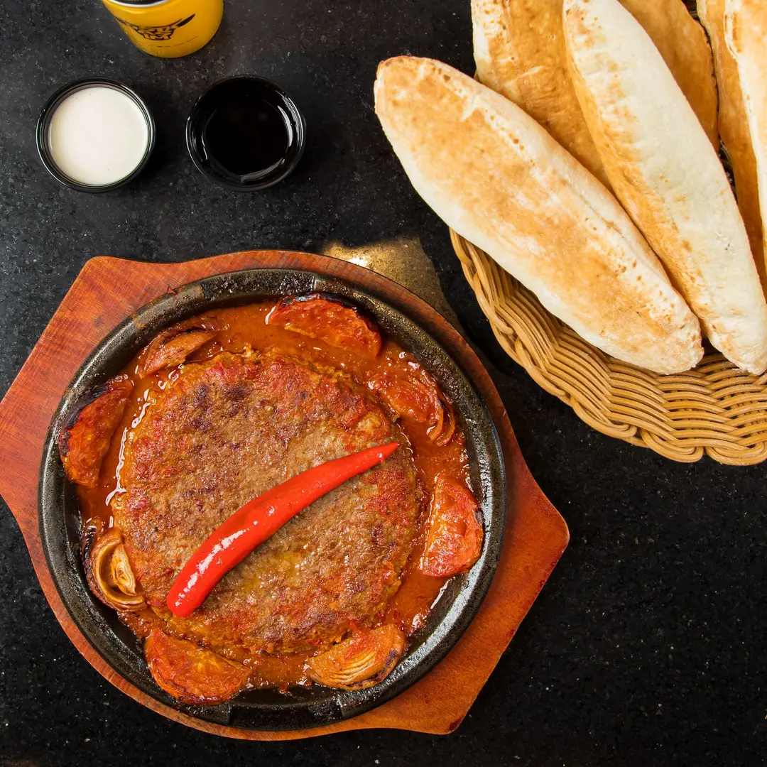 Meat on a plate with special sauce