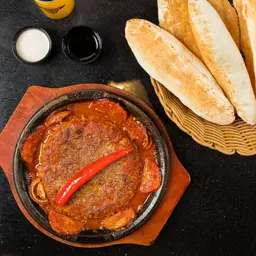 Meat on a plate with special sauce