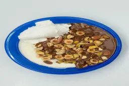 Rice with milk, nuts, Nutella and cream