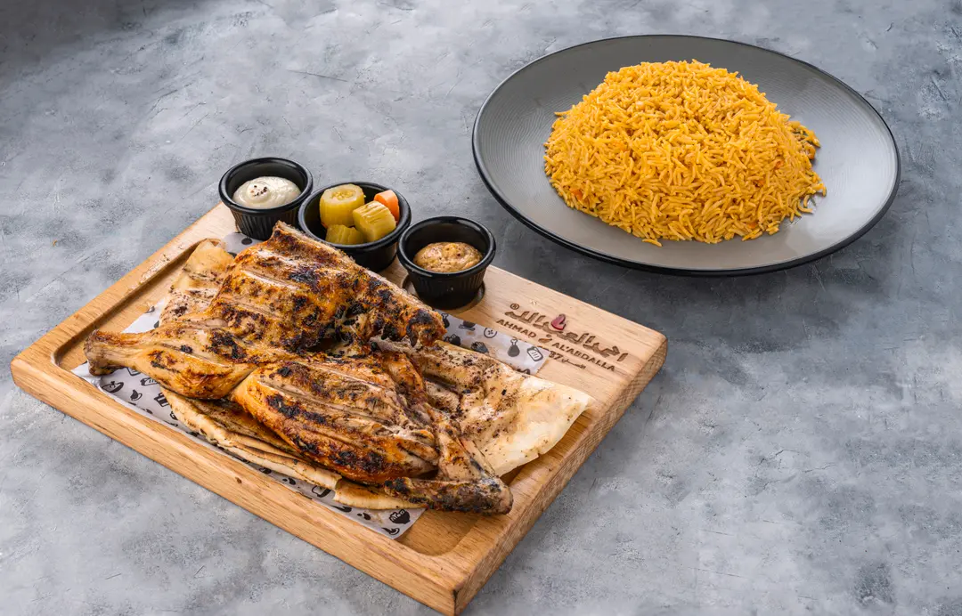 نصف حبة فروج مع رز