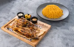 نصف حبة فروج مع رز