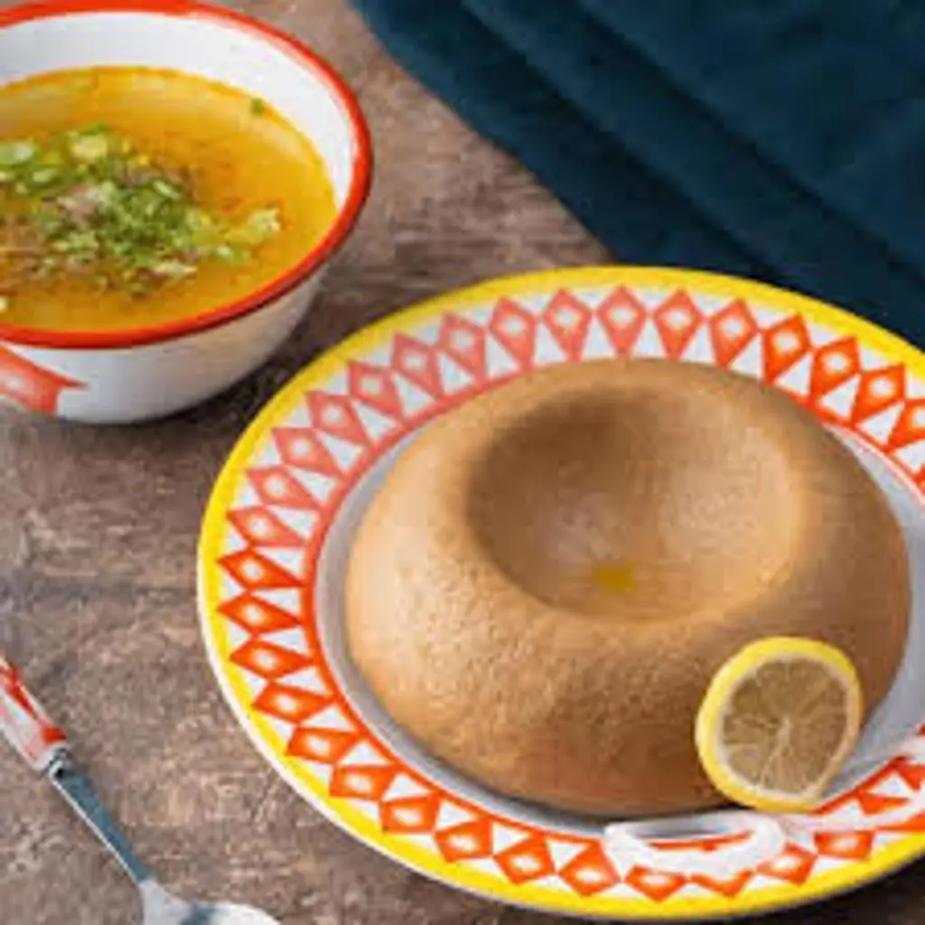 Meat Madghot with Asida and Broth