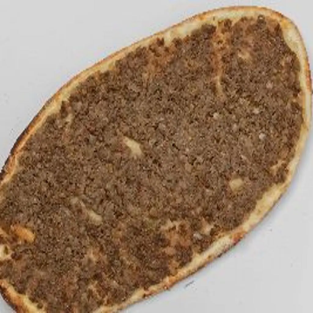Sfiha with Pomegranate Molasses