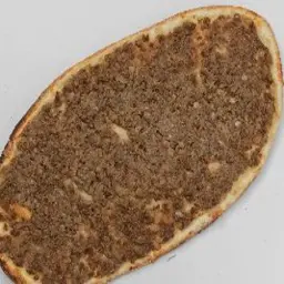 Sfiha with Pomegranate Molasses