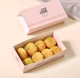 Stuffed Auoon Al Maha (Turkish Basbousa Stuffed With Kiri Cheese)