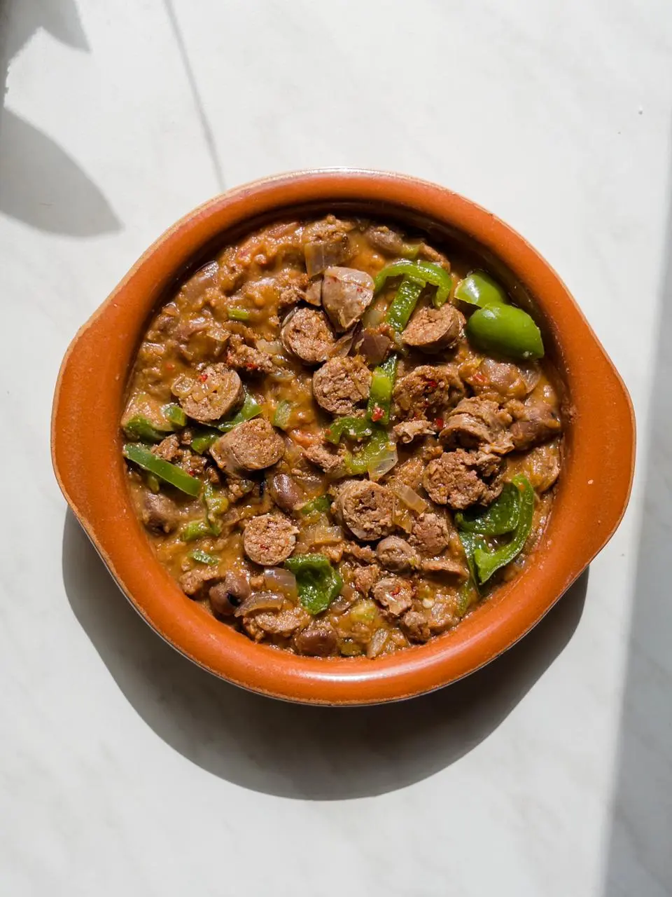 طاجن فول بالسجق