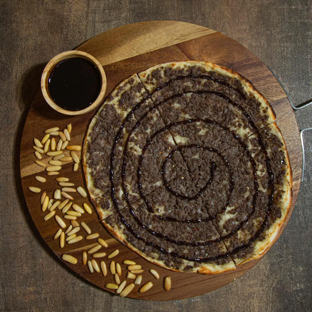 Meat Manoushe Pomegranate Molasses