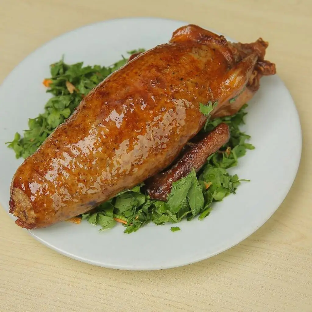 Stuffed pigeon with rice and soup