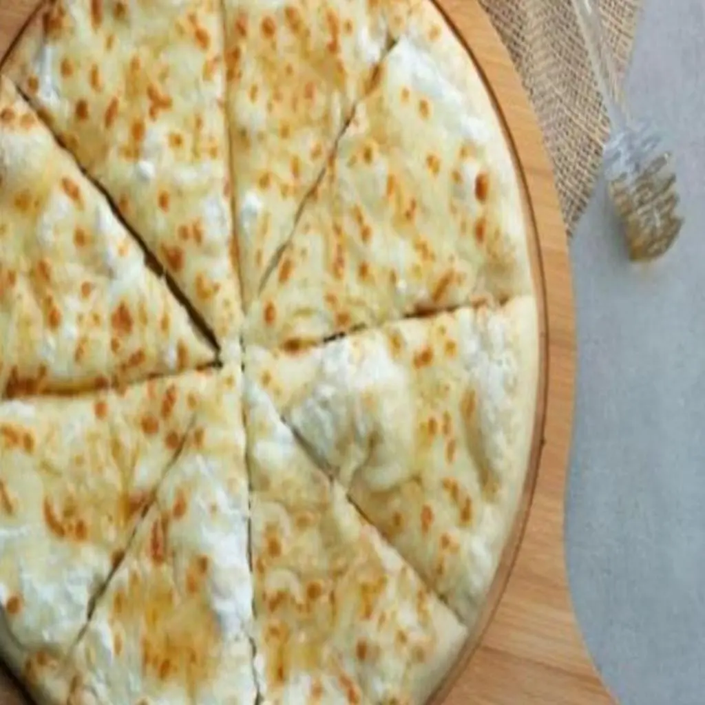 Ush Al Bulbul Pizza