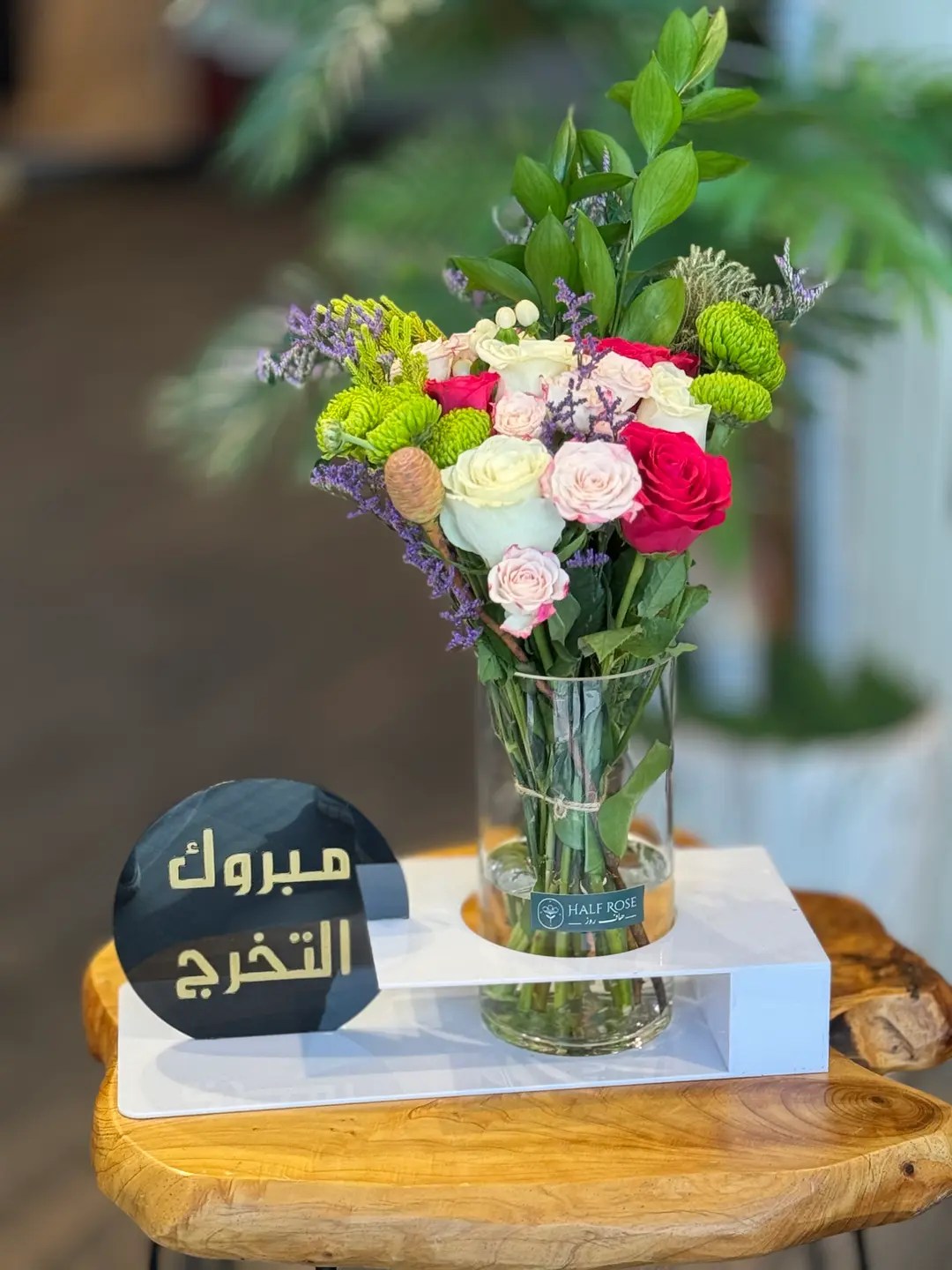 vase of roses with the words congratulations for graduation