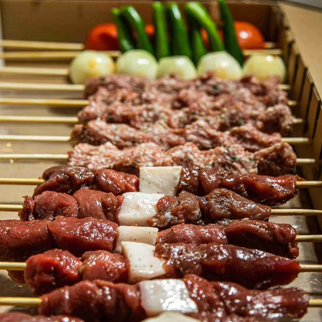 Mixed raw meat box ready to grill