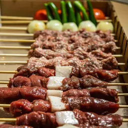 Mixed raw meat box ready to grill