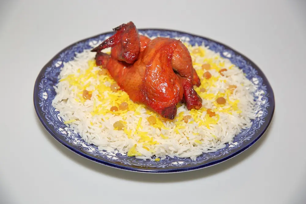 شواية دجاج - نص مع رز عربي