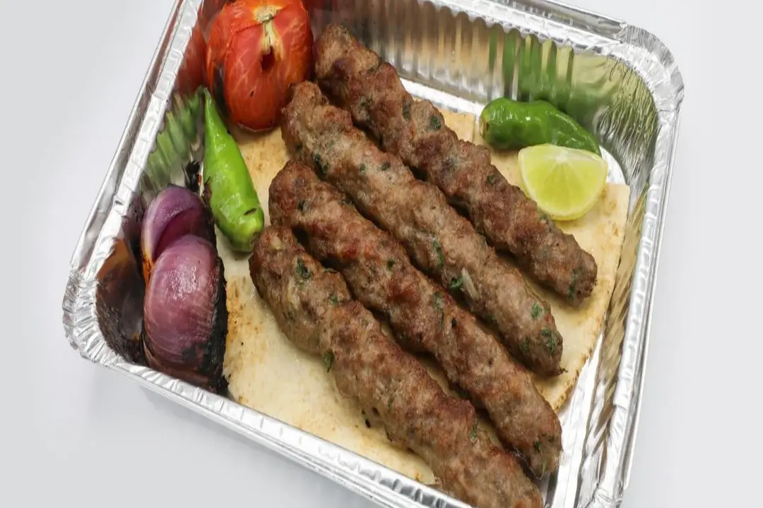 Kebab with pine nuts