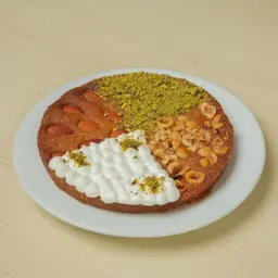 بسبوسة بالمكسرات والقشطة
