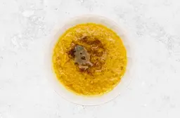 Lentils on a saj with ghee
