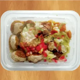 Falafel Salad with Pomegranate Molasses