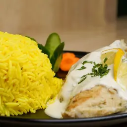 سمك بالطحينه مع ارز بالليمون
