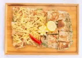 Cheddar mutabbaq with vegetables