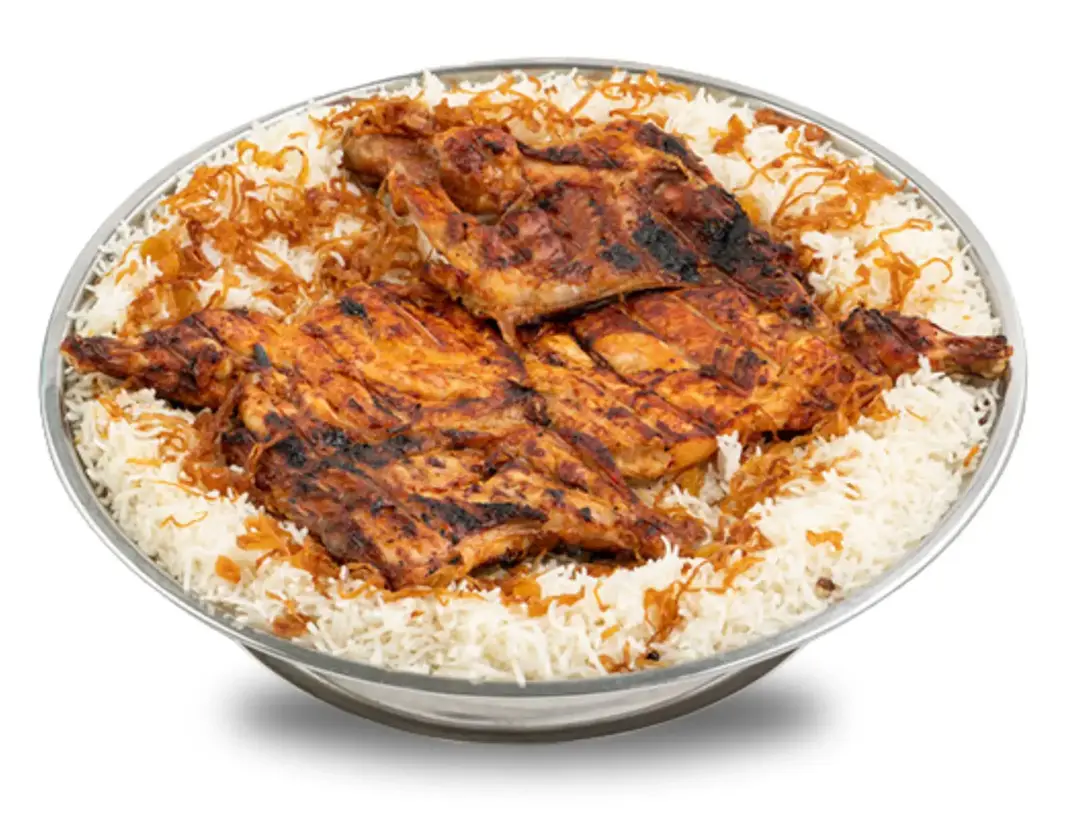 ربع دجاج على الفحم مع الرز